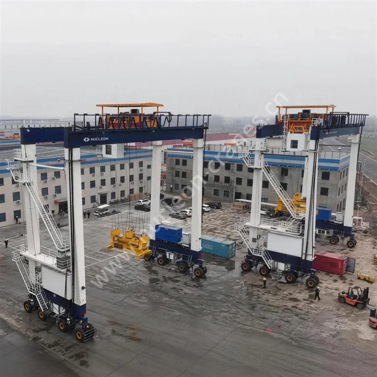 Nucleon RTG41t crane lifting a container with telescopic spreader