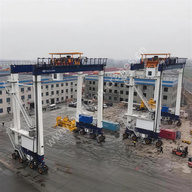 Nucleon RTG41t crane lifting a container with telescopic spreader