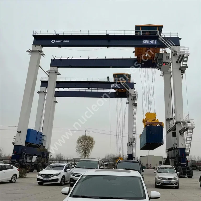 Twin Nucleon RTG41t cranes rated SWL 41T handling container in yard